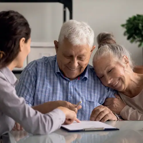 couple signing a document